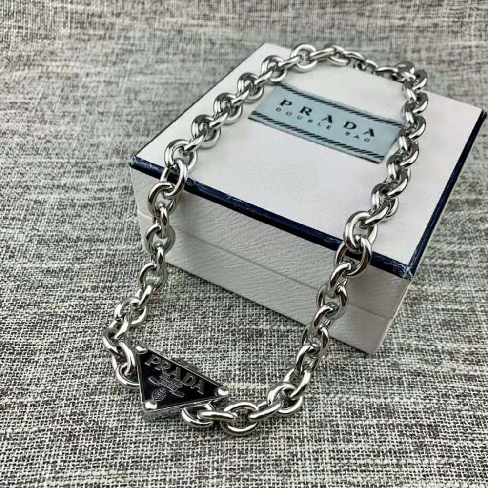 Side angle showing clasp and chain of Prada Women Symbole Necklace in black