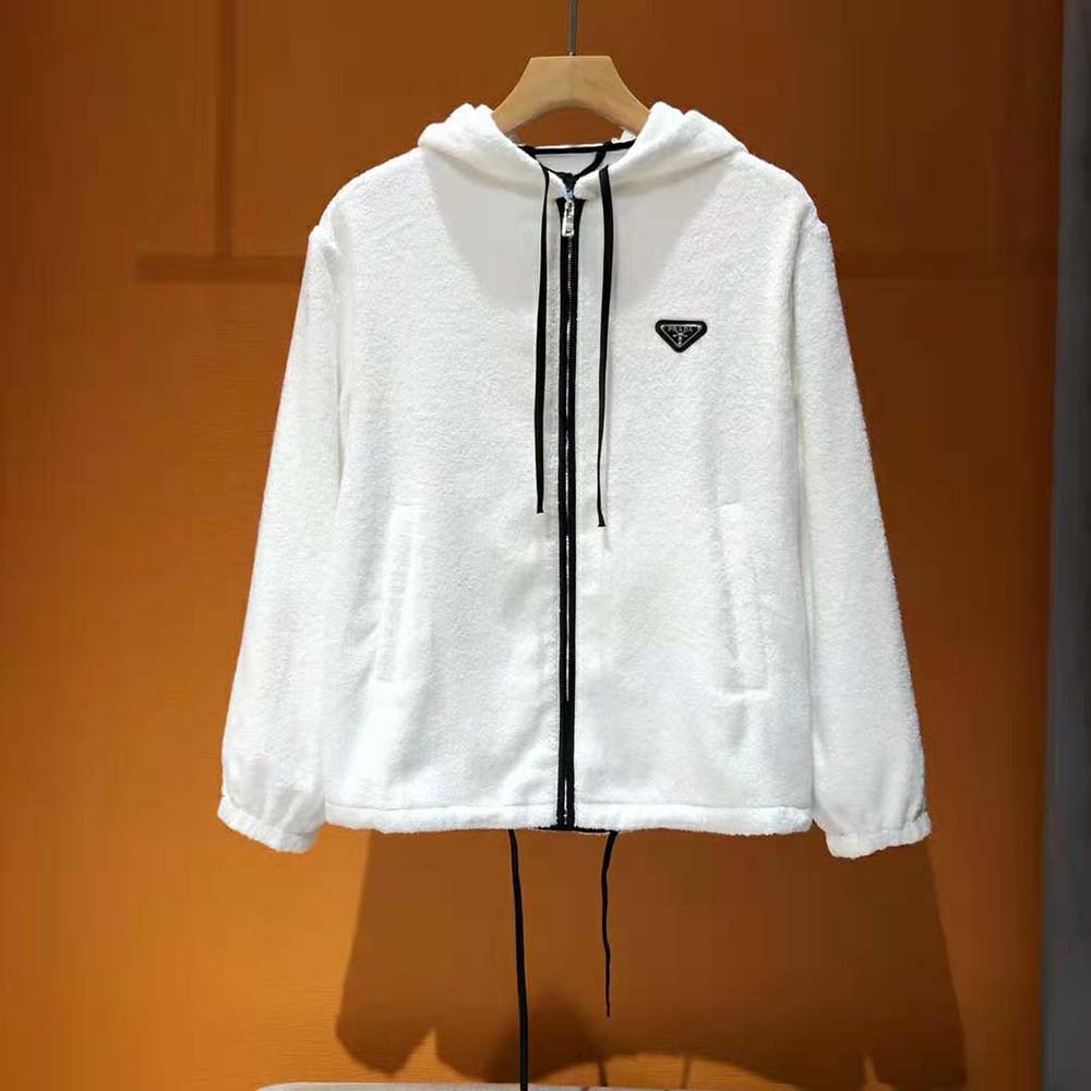 Close-up detail of white terry cloth texture on Prada hoodie