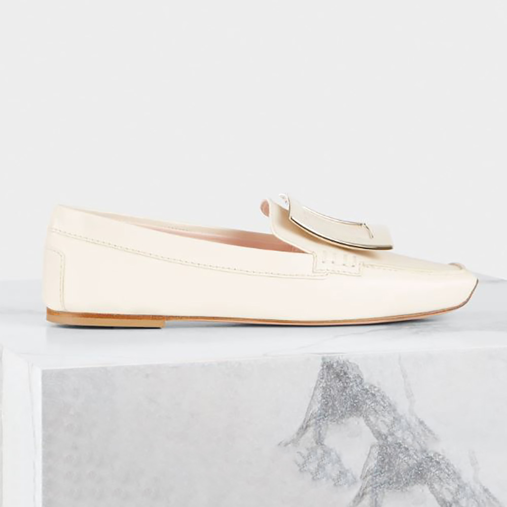 Side view of Roger Vivier Women Viv’ Driver Metal Buckle Loafers in Leather-White