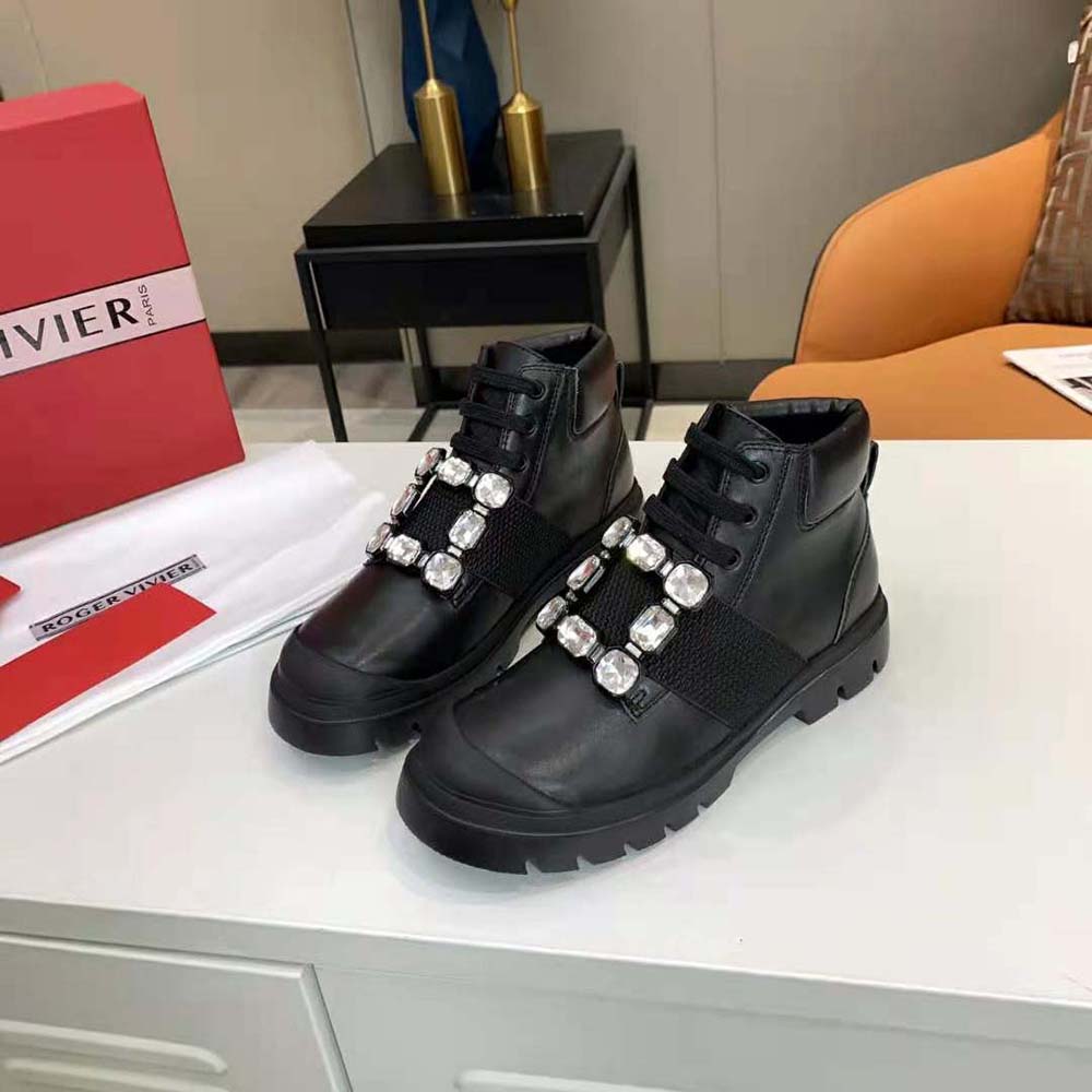 Close-up on sparkling strass buckle of Roger Vivier Walky Viv’ Lace Up Booties