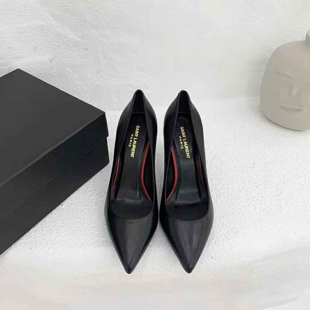 Close-up detail of embossed YSL logo on heel of Anja Escarpin Pump