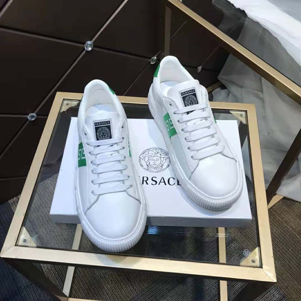 Overhead view highlighting green leather texture of Versace Women A Classic Low Top Greca Sneakers-Green