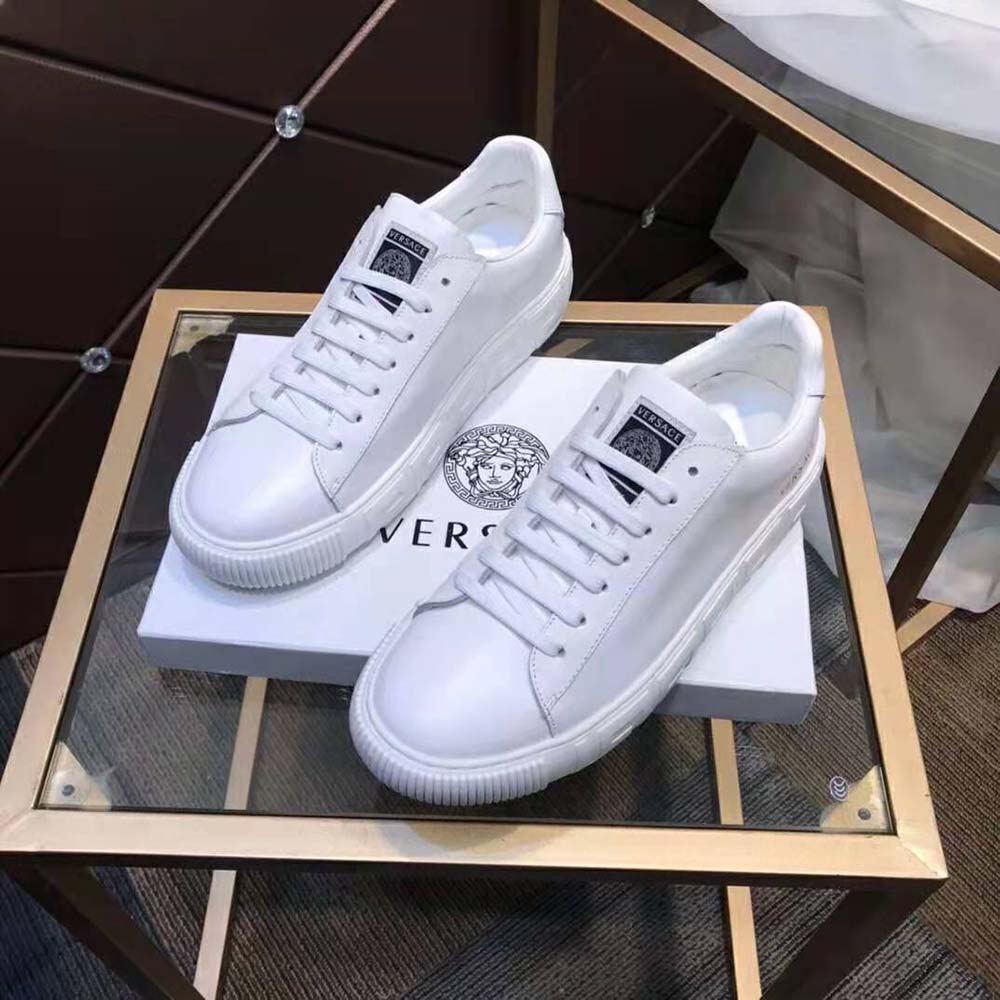 Top view of sleek white leather on Versace Women A Classic Low Top Greca Sneakers-White