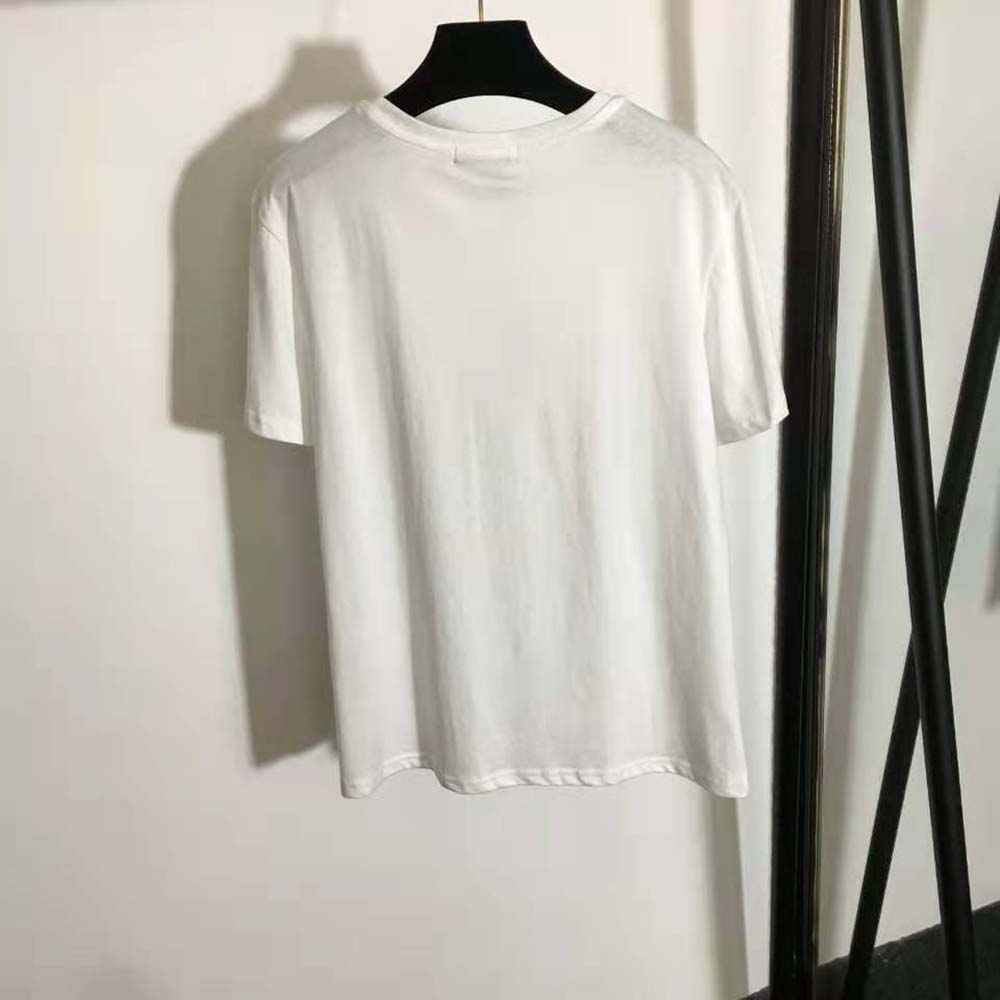 Side angle of Versace Men GV Signature Medusa T-shirt-White on model