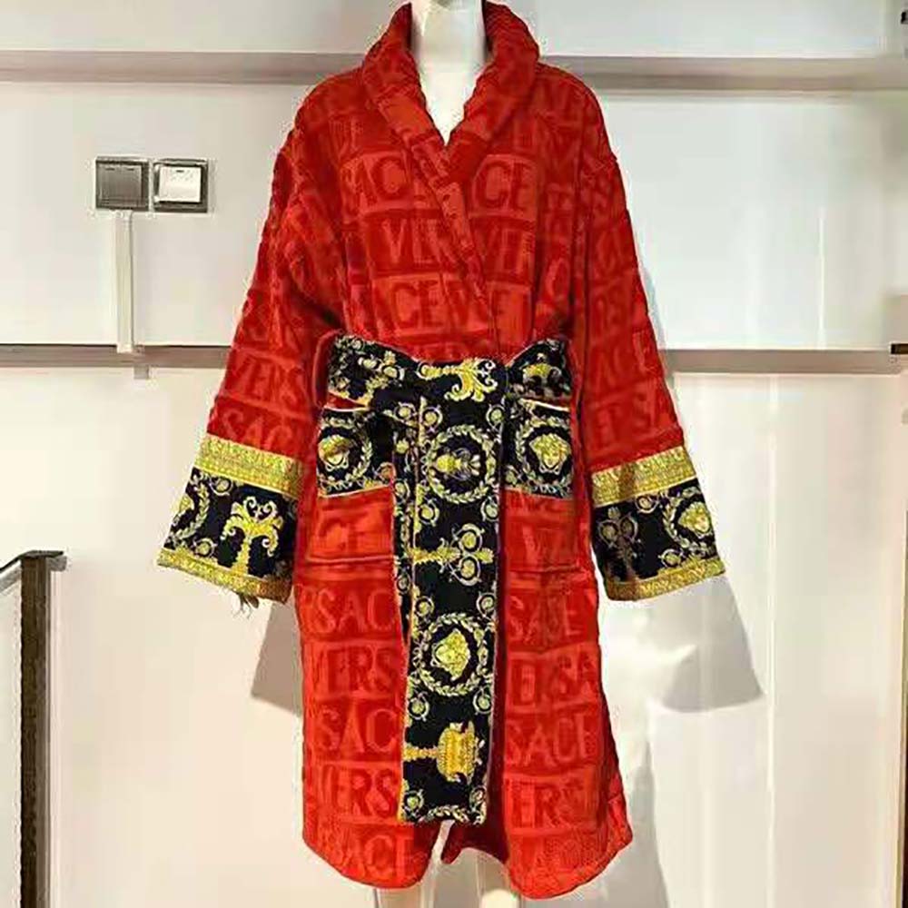 Close-up of gold Medusa button on Versace Women I Baroque Bathrobe-Red