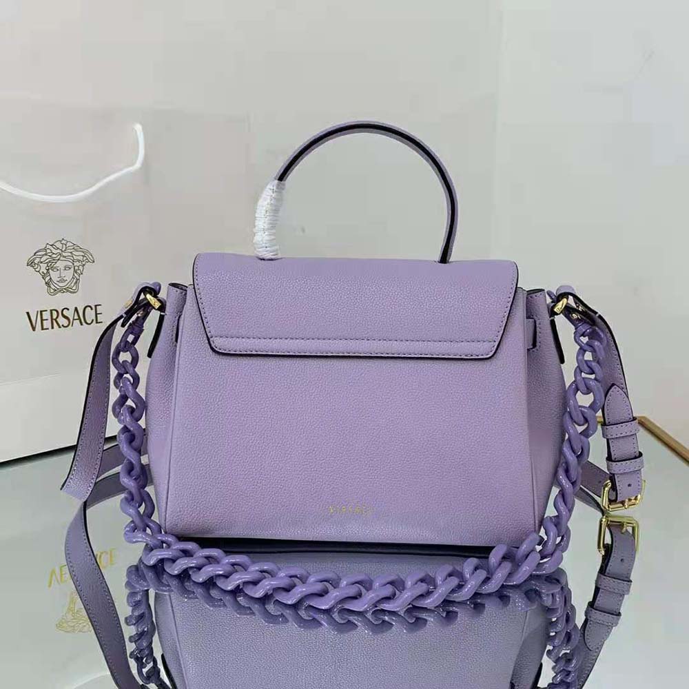 Side angle showing structured silhouette of Versace Women La Medusa Medium Handbag