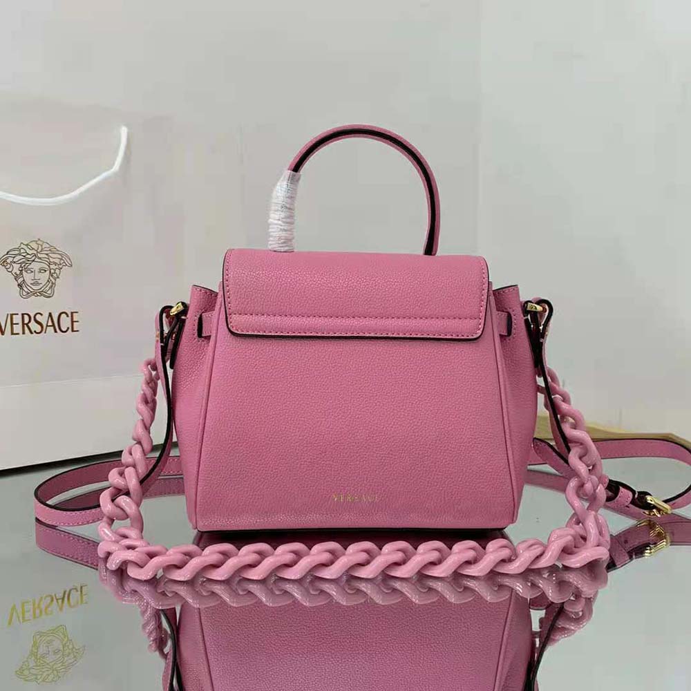 Side profile showing silhouette and smooth pink leather of Versace Women La Medusa Small Handbag