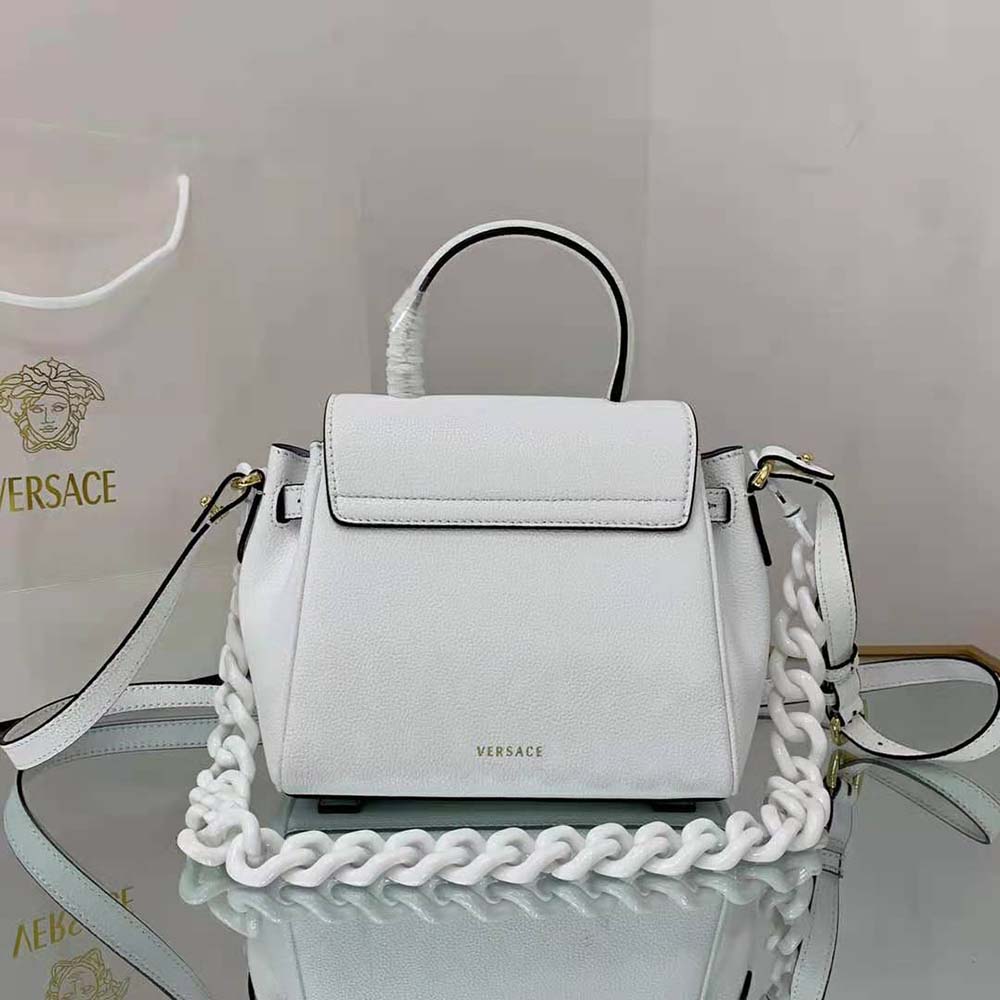 Side angle showing sleek white leather and silhouette of Versace Women La Medusa Small Handbag