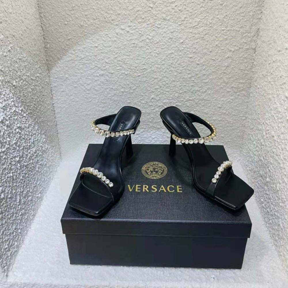 Close-up detail of rhinestone embellishments on Versace Women Rhinestone Mules