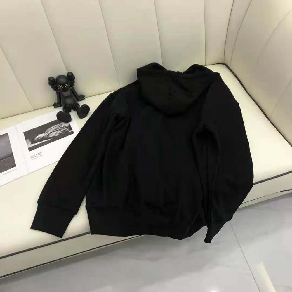 Side angle showing medium fit and fleece texture of Balenciaga Women Hulk Hoodie