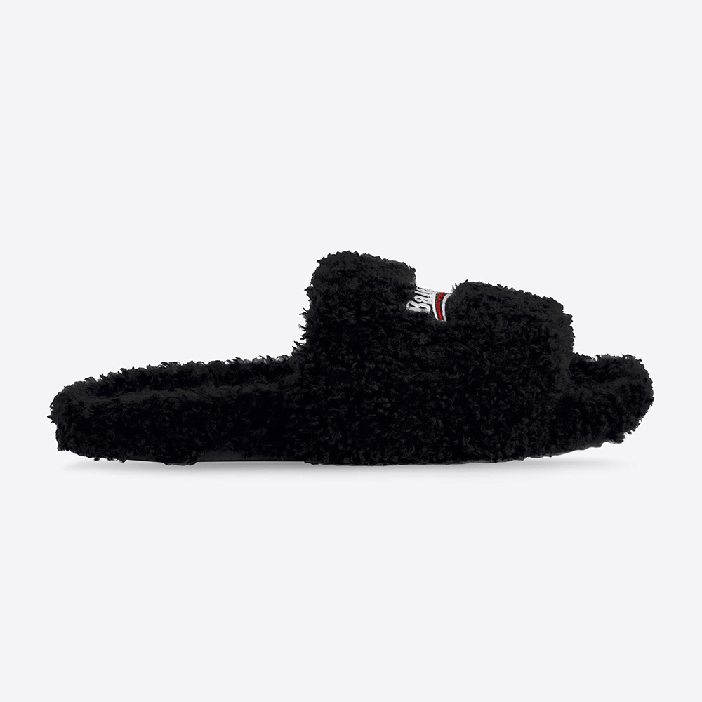 Side profile of Balenciaga Women Furry Slide Sandal in black fake shearling
