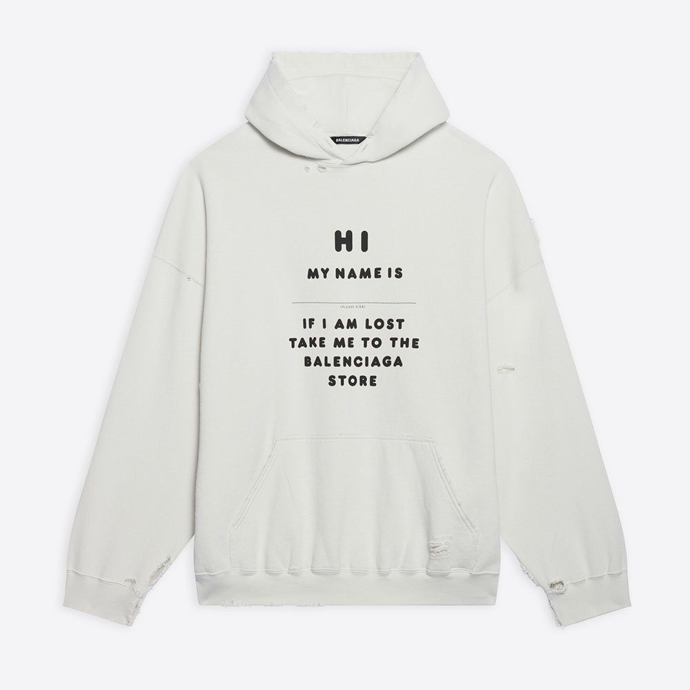 Front view of Balenciaga Women Hi My Name Is Boxy Hoodie in white and black fleece