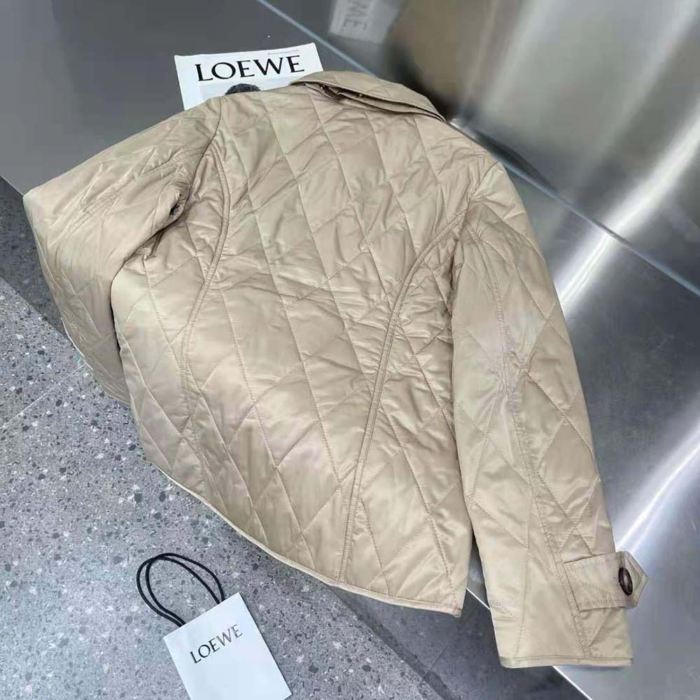 Side angle showing zipper closure on Burberry Women Diamond Quilted Thermoregulated Jacket