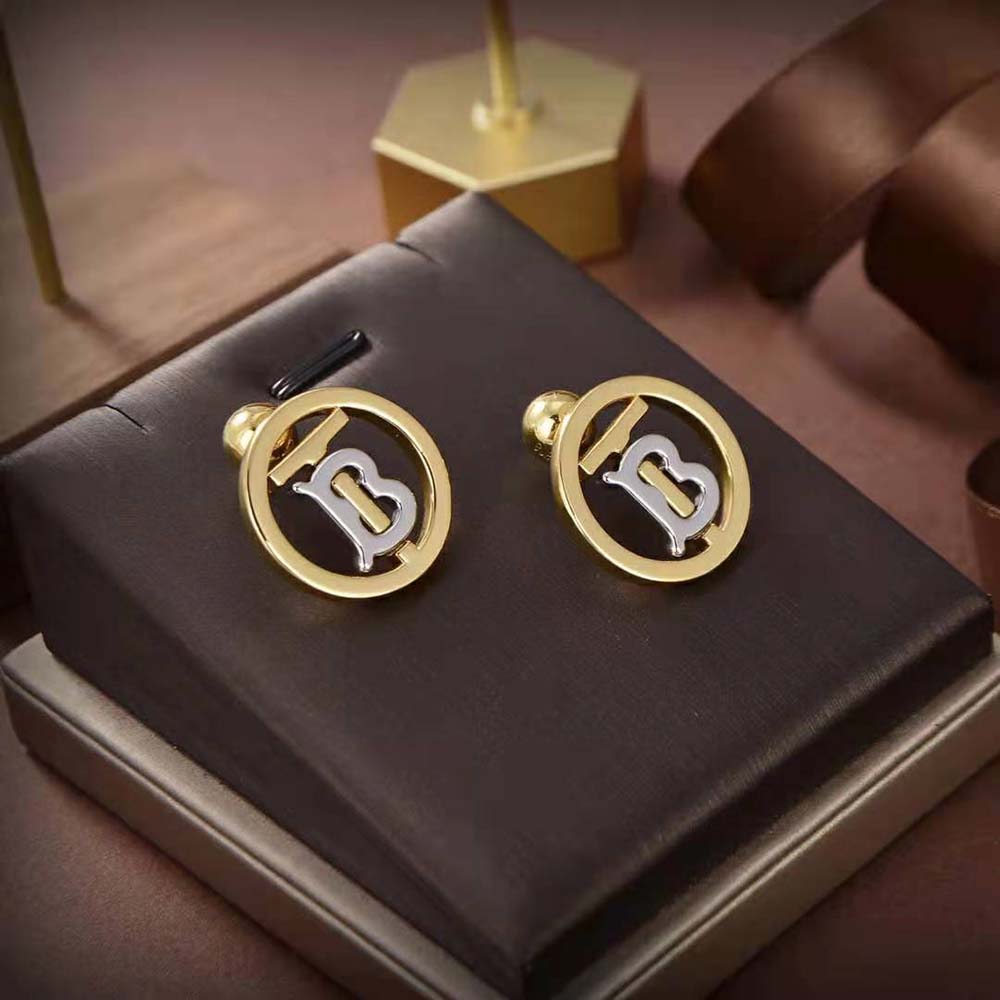 Side angle showing secure post closure of Burberry Monogram Motif Earrings