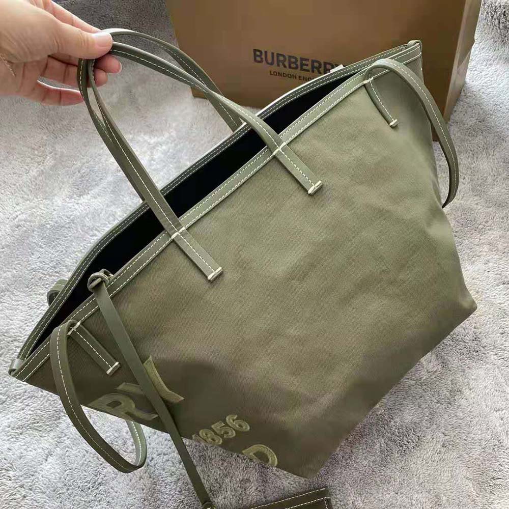 Side profile showing green linen cotton canvas on Burberry Mini Horseferry tote