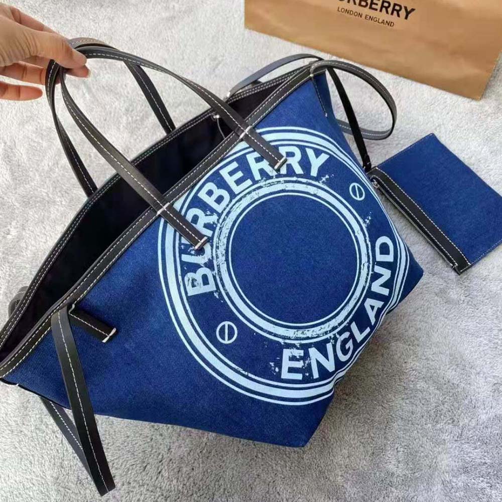 Close-up of Mini Logo graphic and silver hardware on denim tote