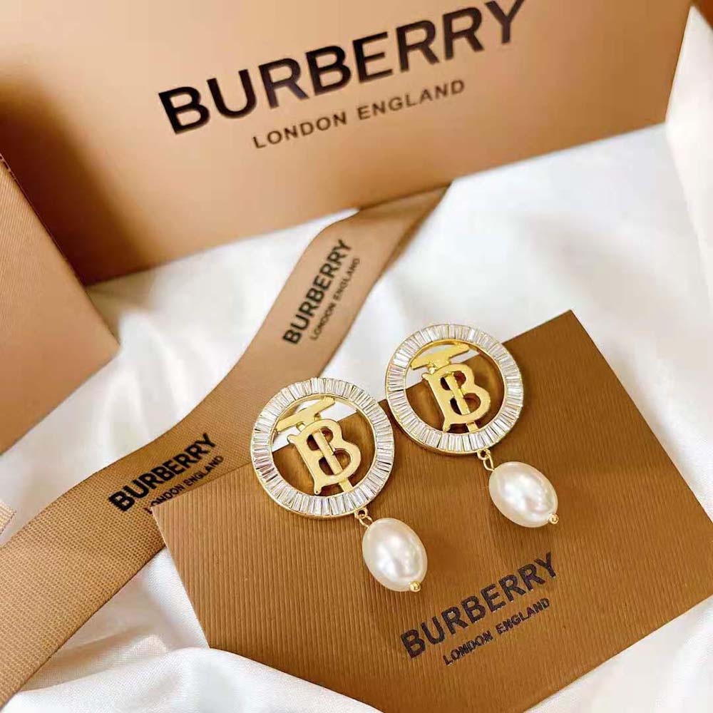 Detail shot of push-back closure on Burberry Women Pearl Detail earrings