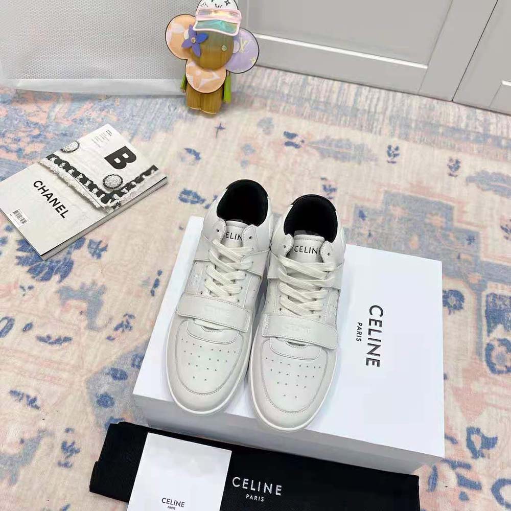 Close-up on scratch detail and laces of Celine Women CT-02 Mid Sneaker