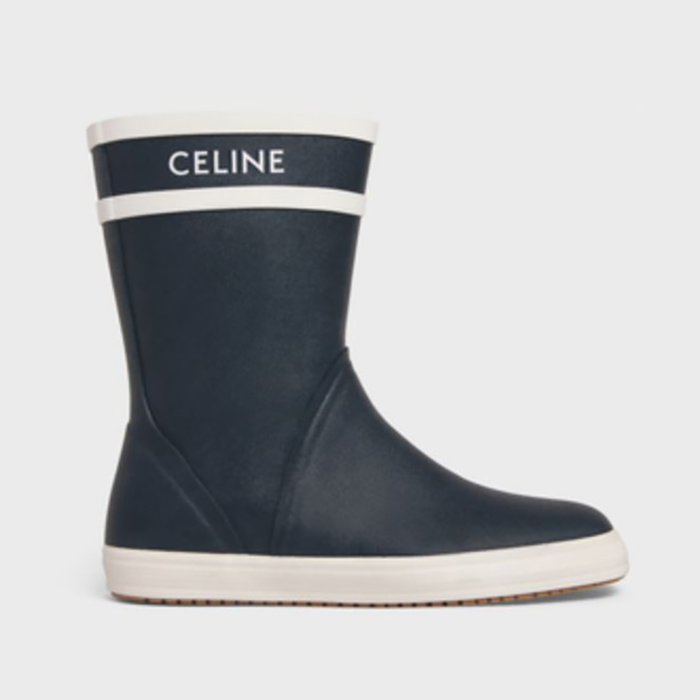 Side view of Celine Women Flat Half Boot Les Bottes DE Pont Celine in Natural Rubber-Navy