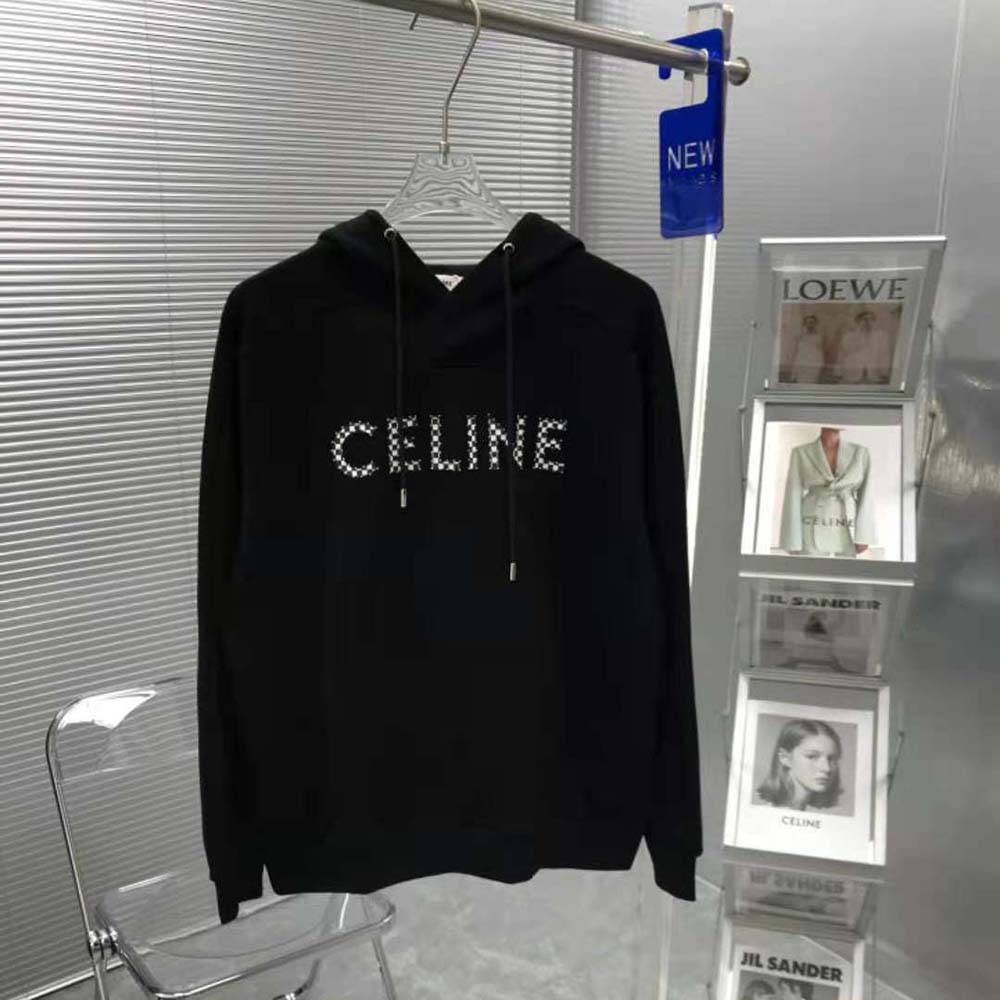 Close-up of silver studs on black Celine Men Loose Sweatshirt