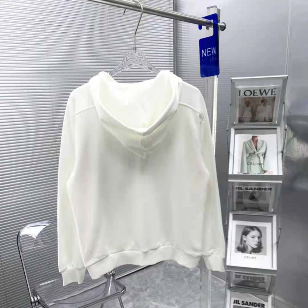Side angle showing relaxed fit of Celine Men Loose Sweatshirt in white