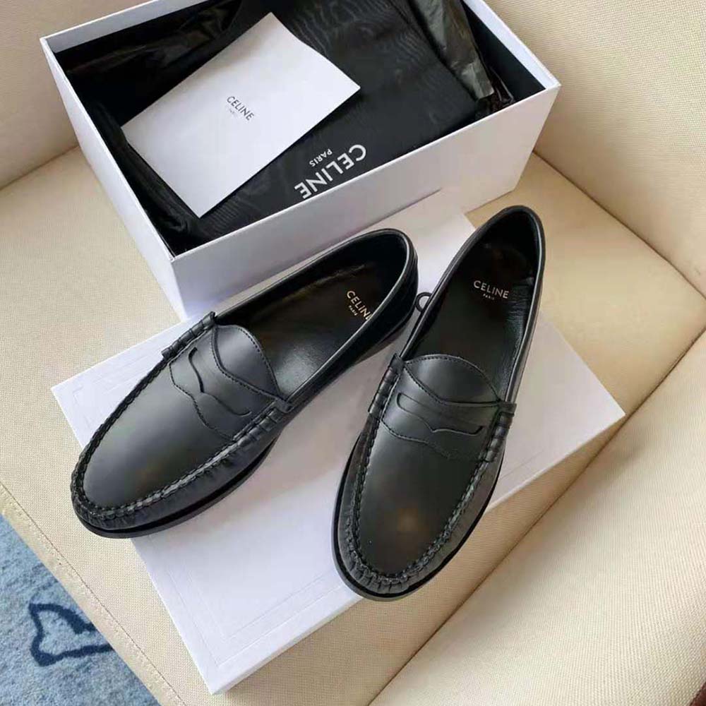 Close-up of black polished calfskin leather on Celine Women Luco Loafer