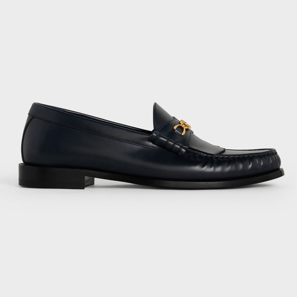 Side profile of Celine Women Luco Maillon Triomphe Loafer in black polished calfskin