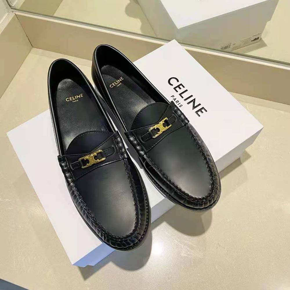 Close-up of gold-tone Triomphe hardware on Celine Women Luco Loafer
