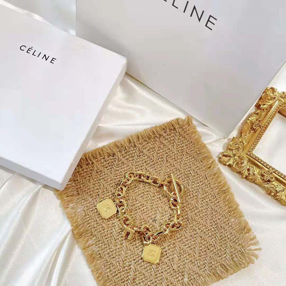 Styled shot of Celine Women Maillon Triomphe Charms Bracelet worn on wrist