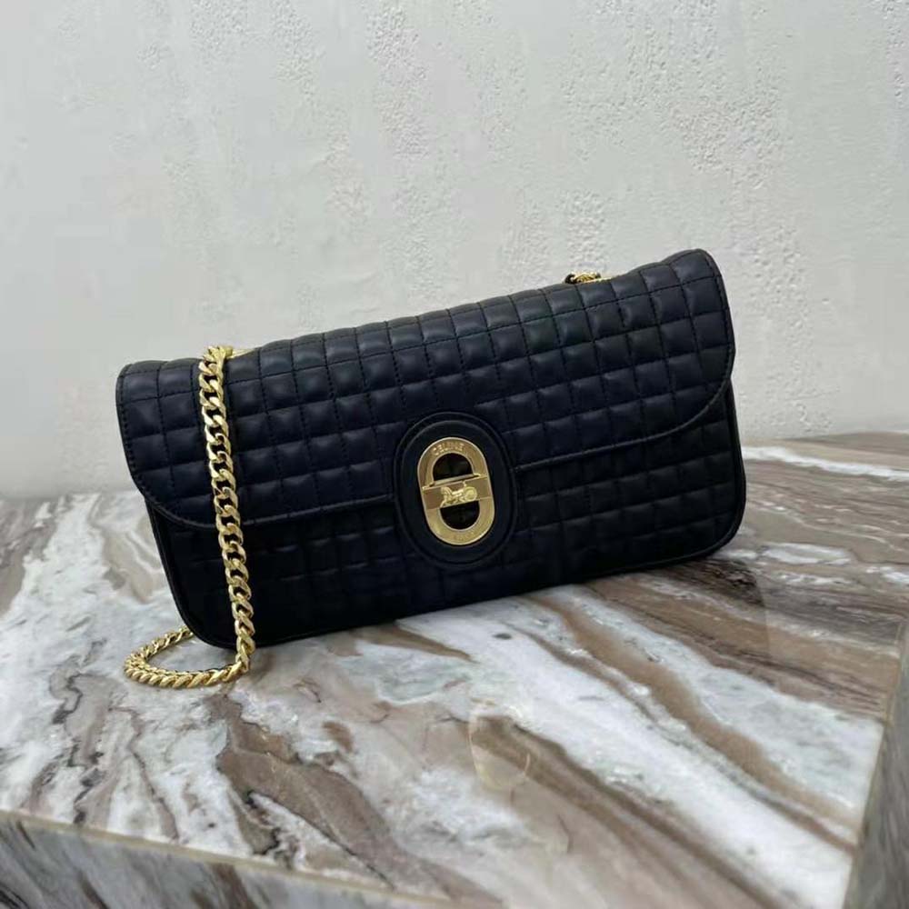 Close-up of quilted lambskin texture and gold chain strap detail