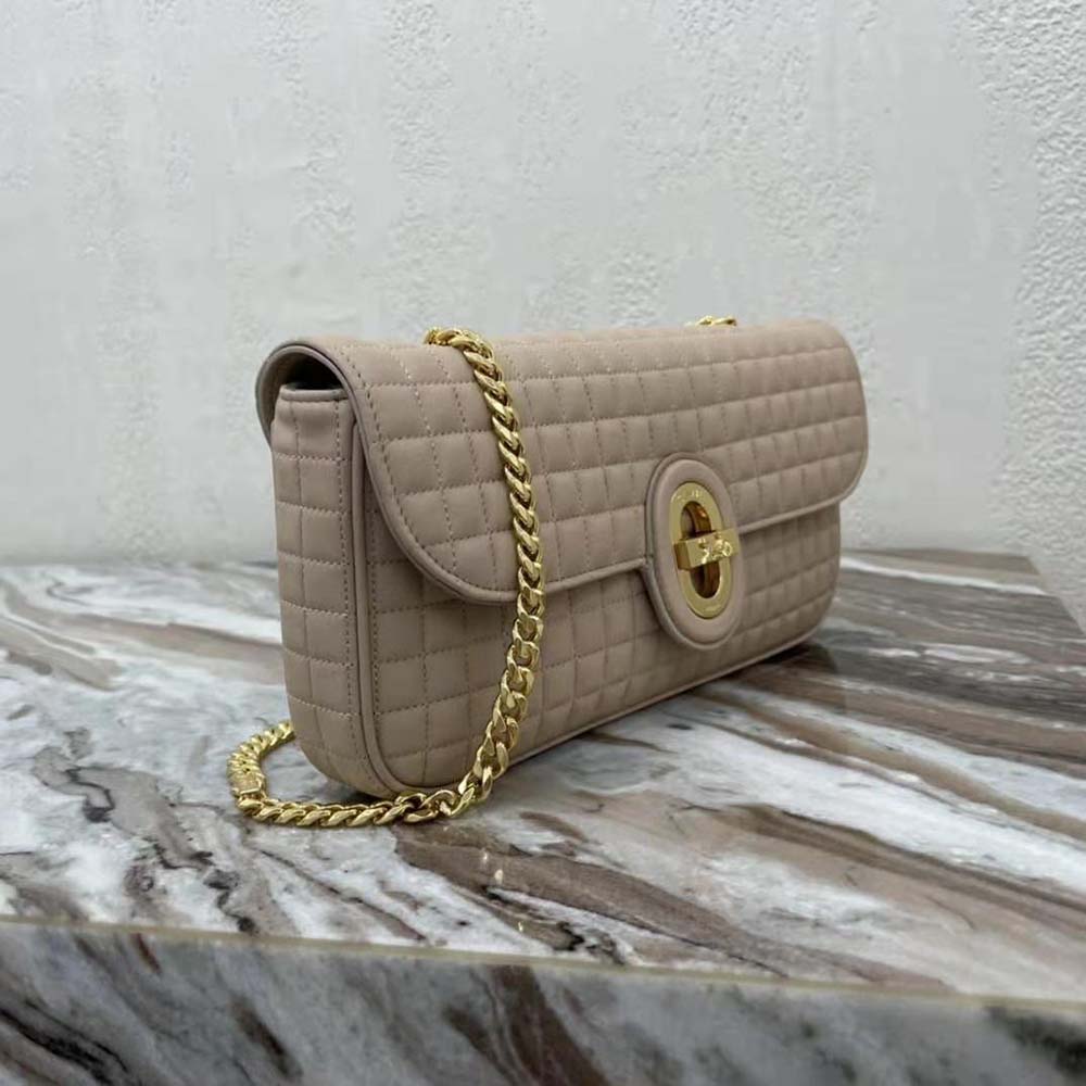 Side angle showing silhouette and strap detail of Celine Medium Chain Sulky Bag