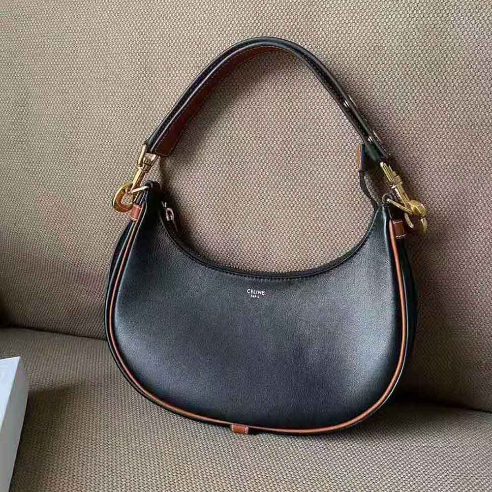 Close-up of gold clasp on Celine Women Medium Strap Ava Bag in Smooth Calfskin-Black