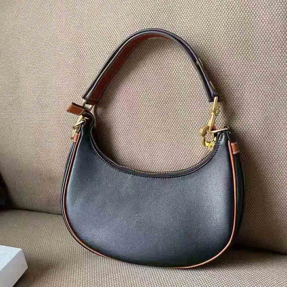 Side angle showing adjustable strap on Celine Women Medium Strap Ava Bag in Smooth Calfskin-Black