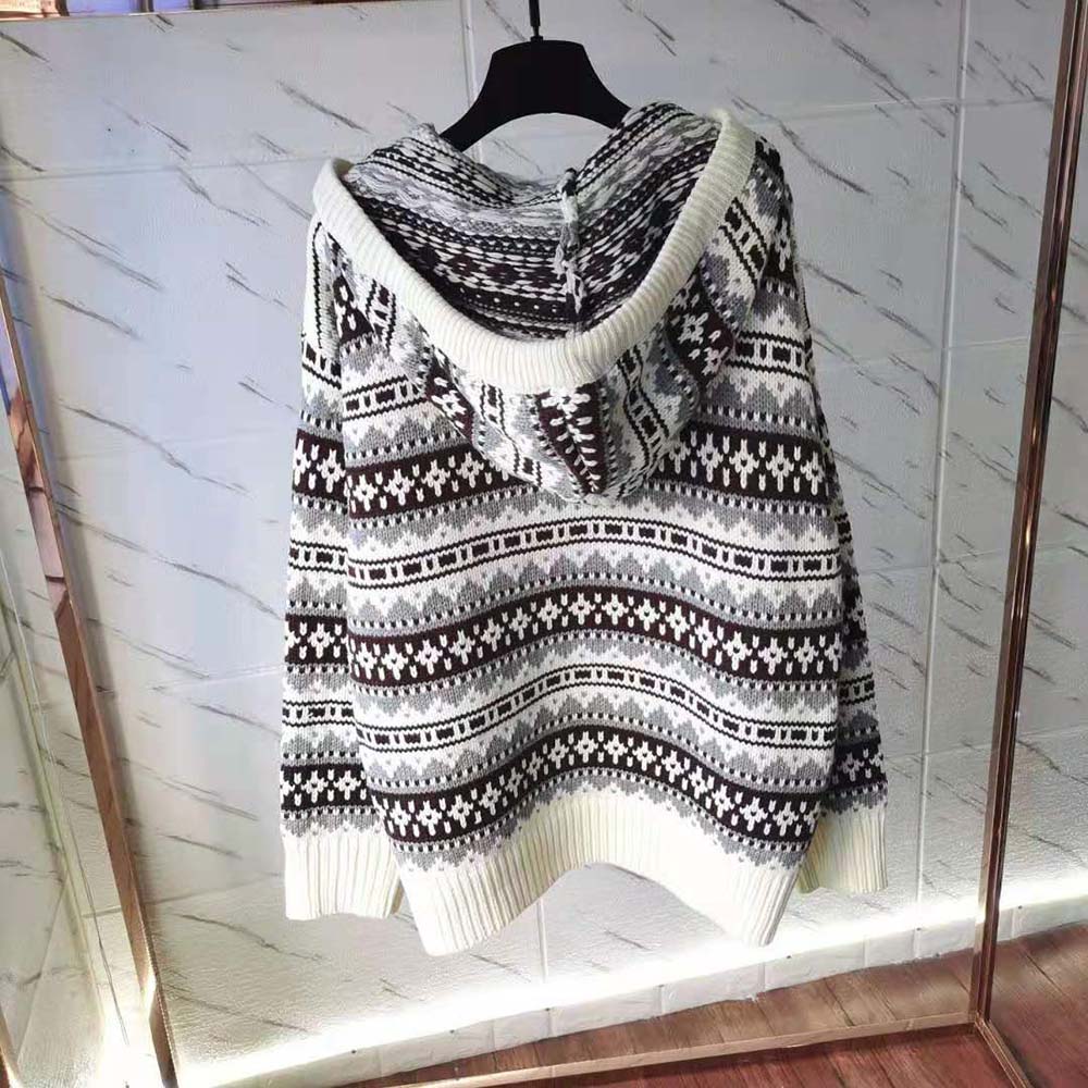 Side angle showing oversized fit of Celine Women Oversized Shetland Baja Pullover