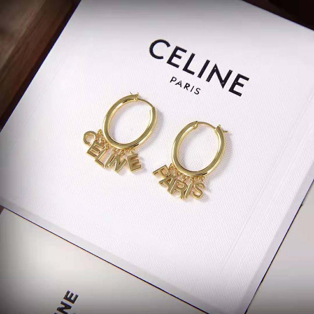 Close-up of clasp detail on Celine Women Paris Hoops gold earrings