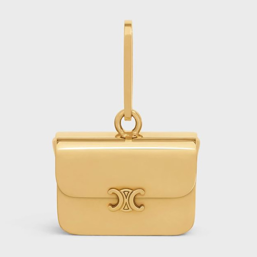 Close-up of Celine Women Separables Triomphe Bag Pendant gold finish detail