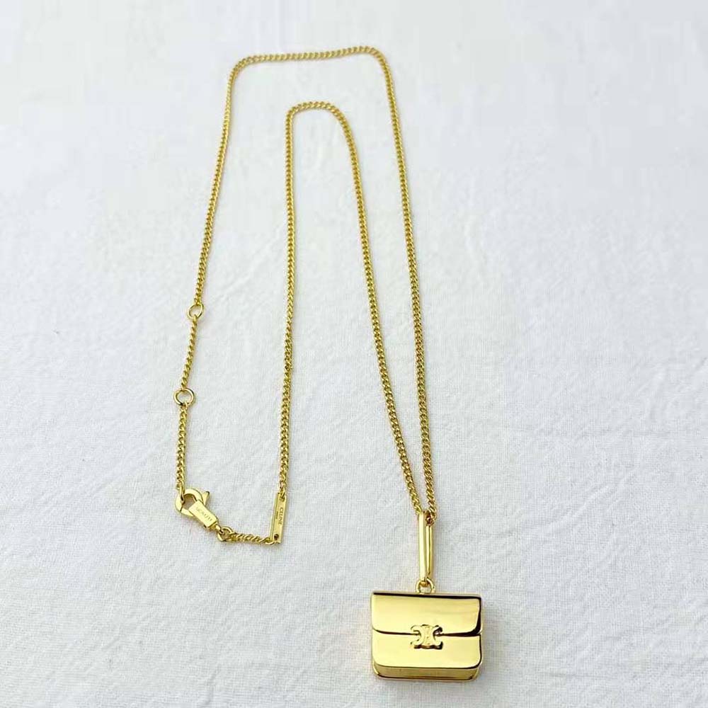 Side angle showing clasp of Celine Women Separables Triomphe Bag Pendant