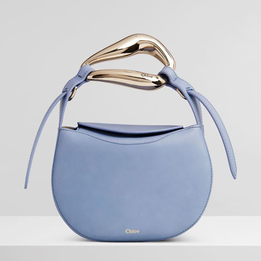 Front view of Chloe Women Kiss Small Purse in blue small grain calfskin