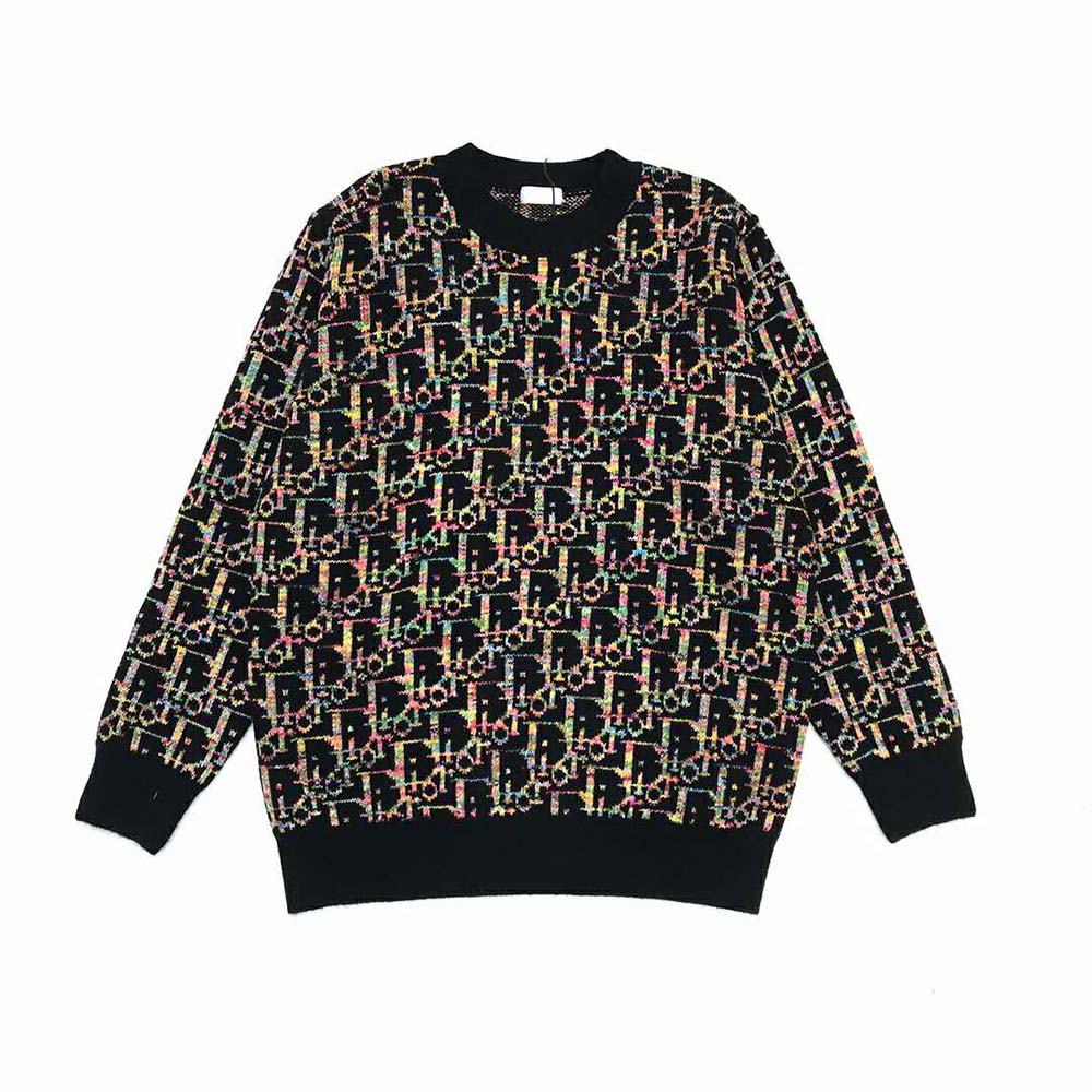 Close-up of jacquard pattern on Dior Men Oblique Sweater black wool