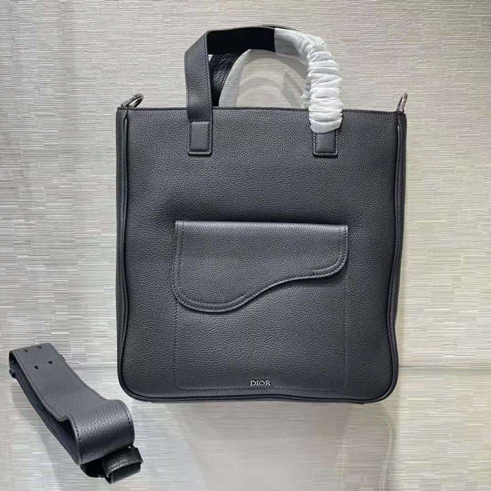 Close-up of navy grained calfskin texture on Dior Men Saddle Tote Bag