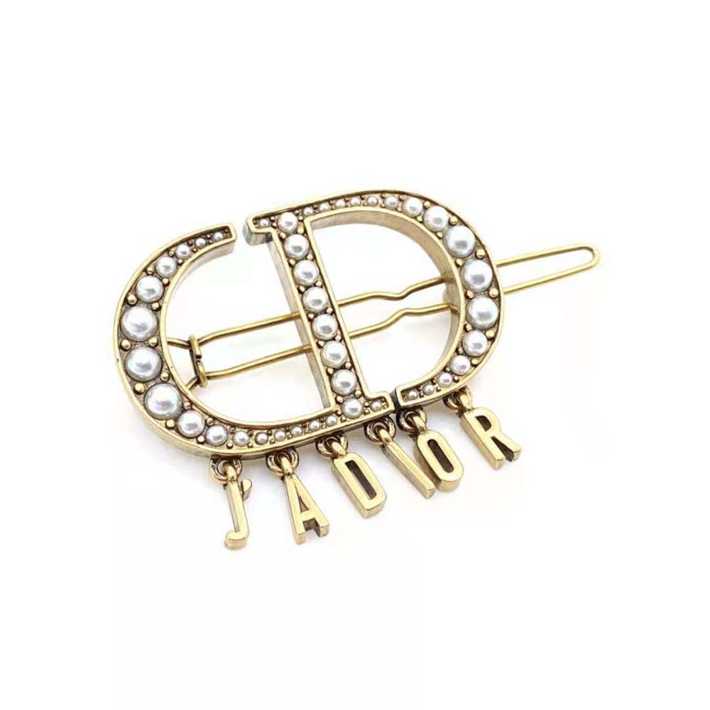 Top angle showing white resin pearls on Dior Women 30 Montaigne Barrette