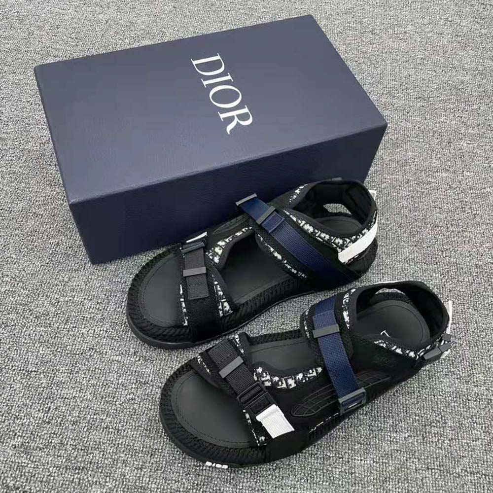 Close-up of black suede and silver hardware on Dior Women Atlas Sandal