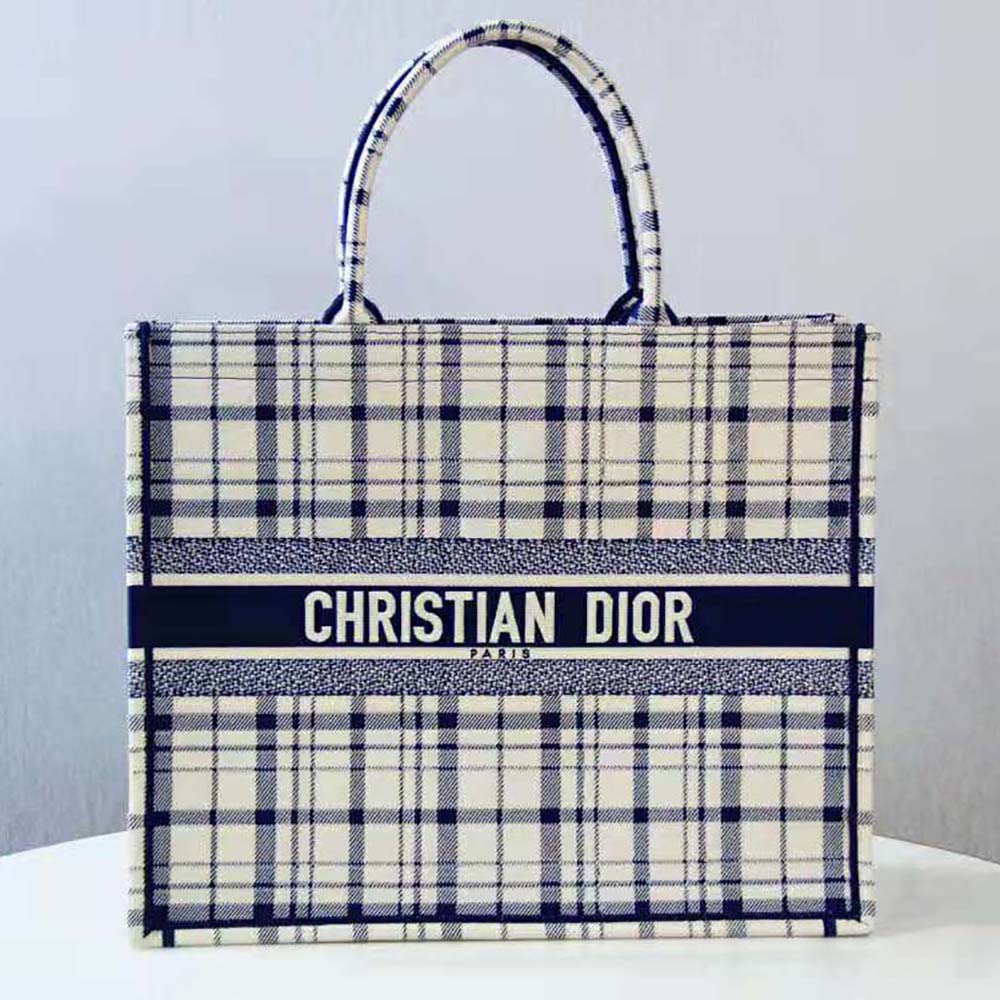 Close-up detail of blue embroidery on Dior Women Book Tote