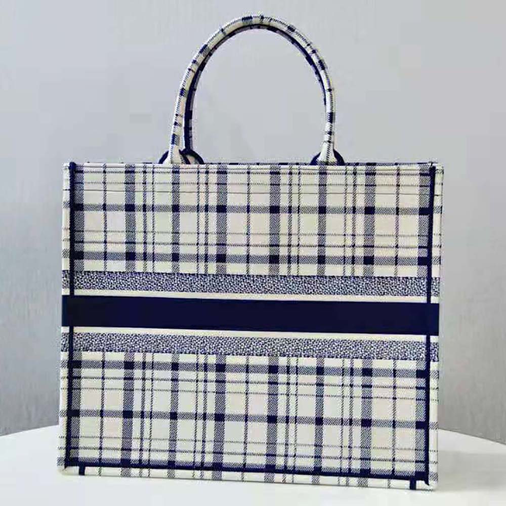 Side angle showing spacious interior of Dior Women Book Tote