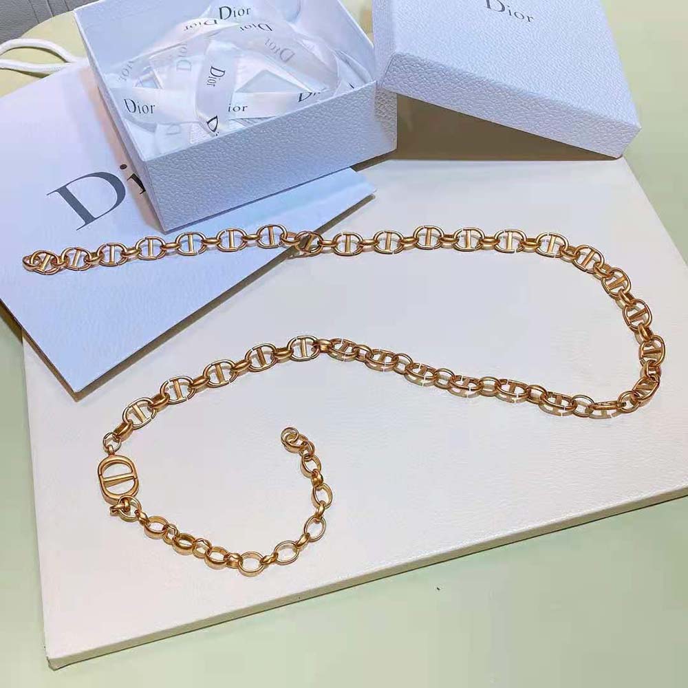 Side angle showing clasp and slim silhouette of Dior Women Caro Chain Belt