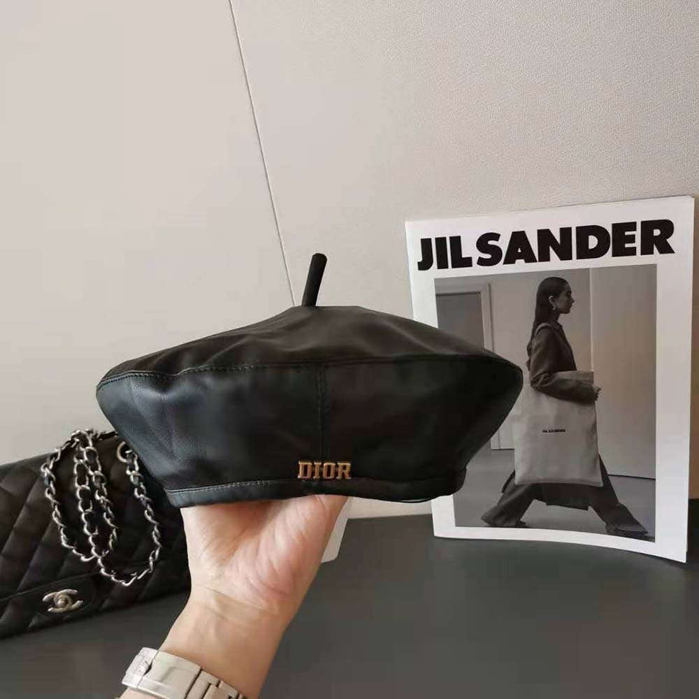 Close-up of silver-tone 'D' charm on Dior Women D-Dream Beret Black Lambskin