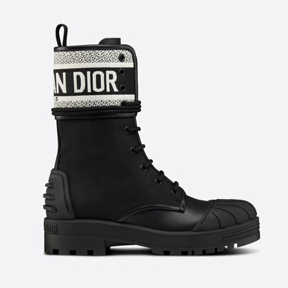 Side profile of Dior Women D-major Ankle Boot in black and white