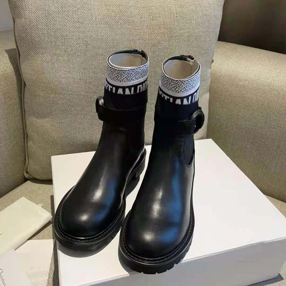 Close-up of lace-up and Dior D-major logo on ankle boot