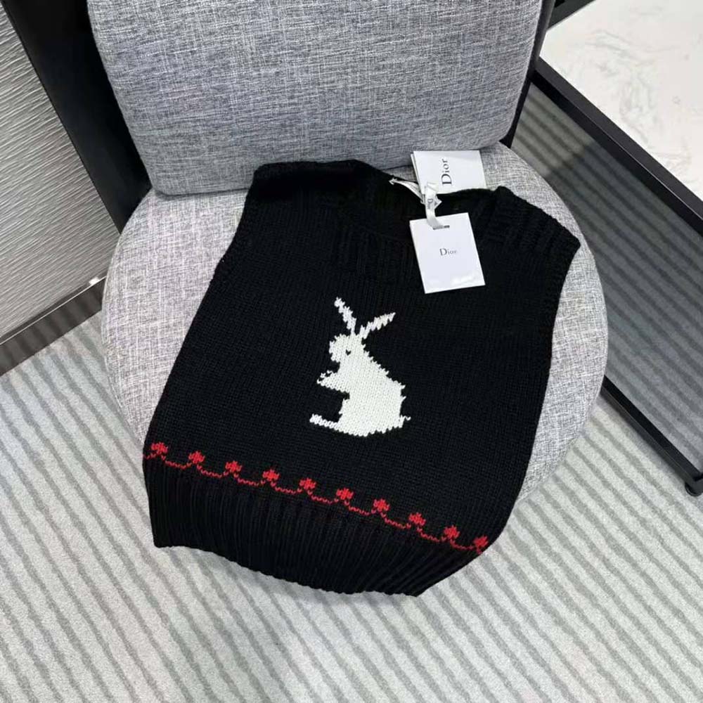 Close-up of Dioramour knit pattern on Dior sleeveless sweater in black white and red