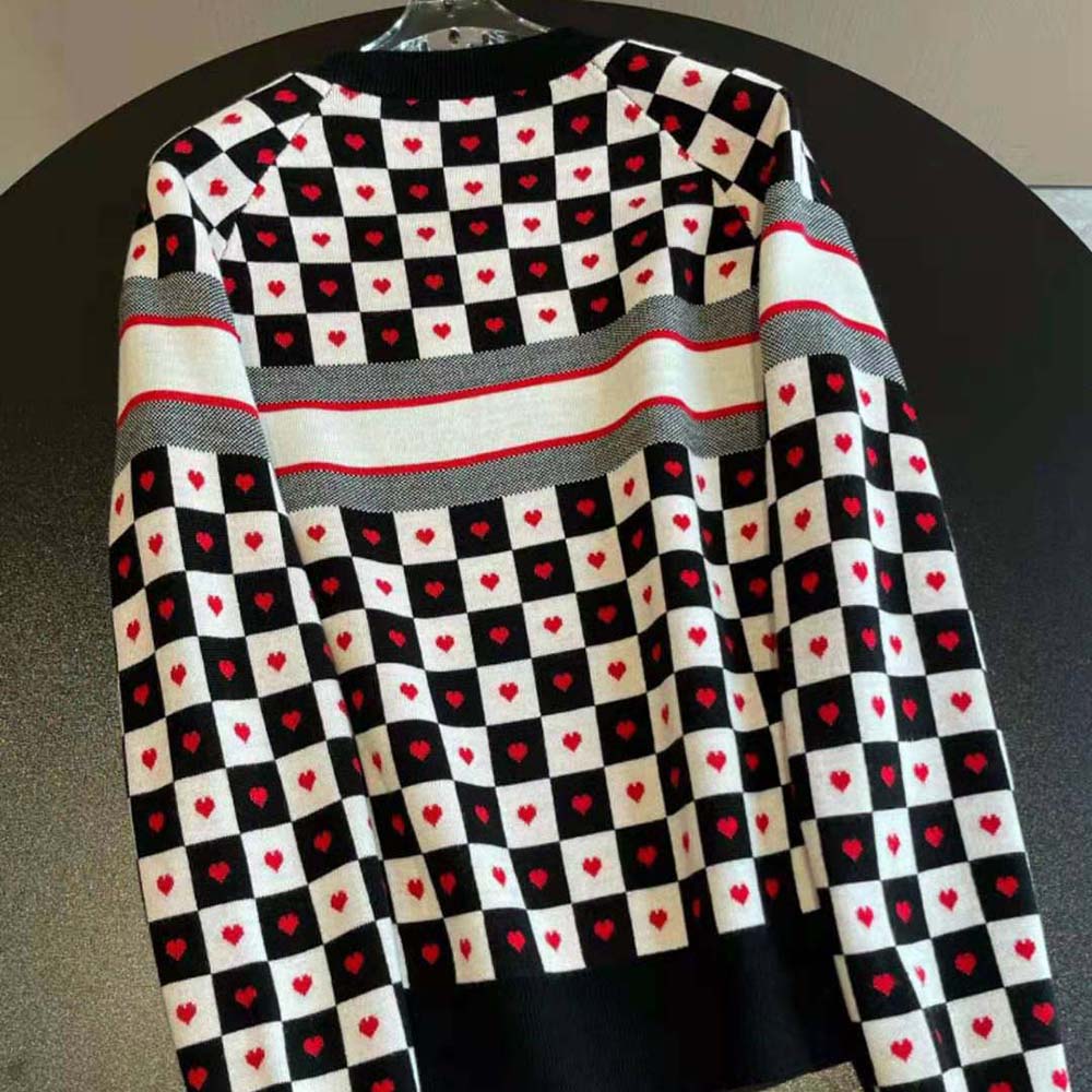 Side profile showing relaxed silhouette of Dior Women Dioramour Sweater